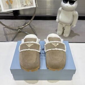 Prada Beige Suede Shearling Clogs